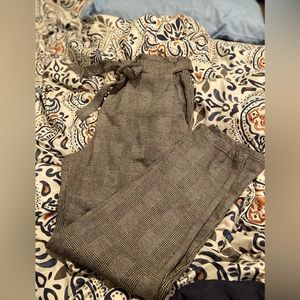 Grey checkered pants size large, like new. stretchy waist with tie